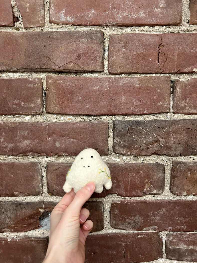 &quot;Pocket Ghost&quot;, 2025, Wet felted Ontario wool w/ naturally dyed embroidery, 2.5&quot; x 3&quot;