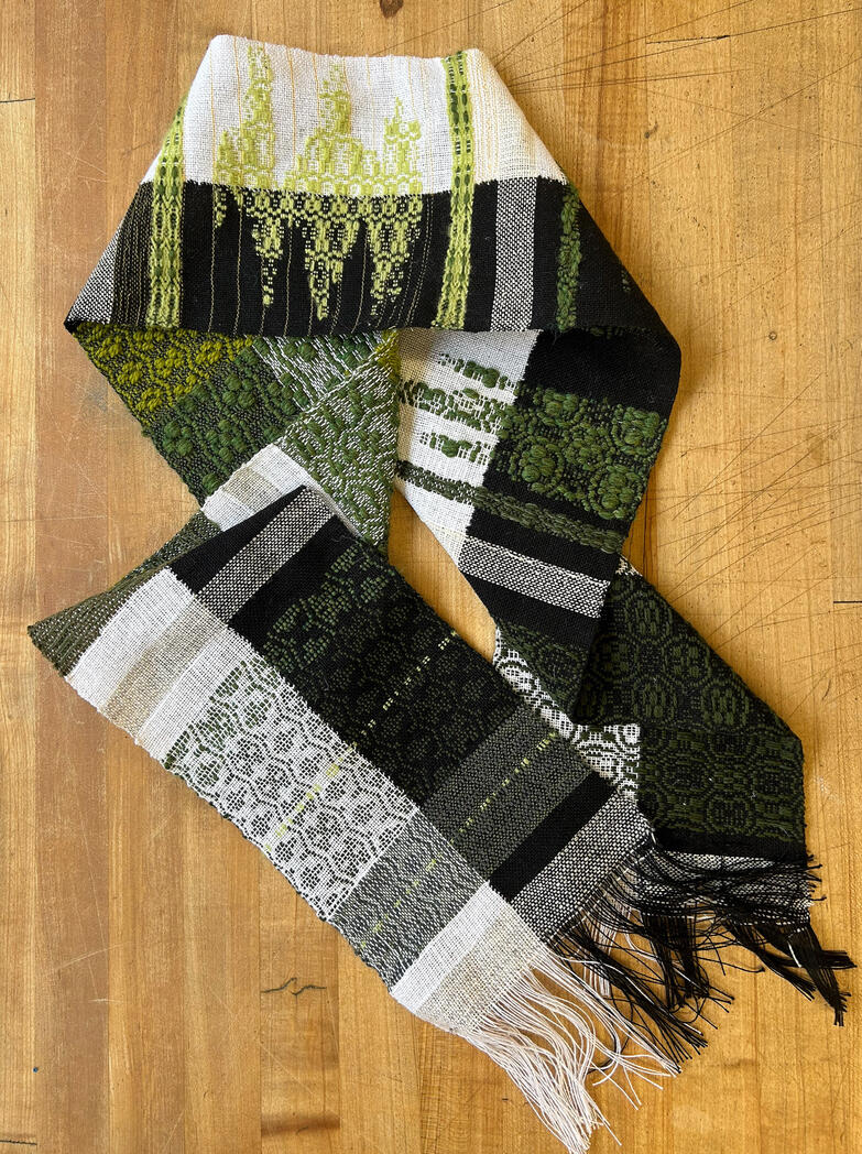 dancing in the midnight dogwood, 2025, wool and cotton yarn